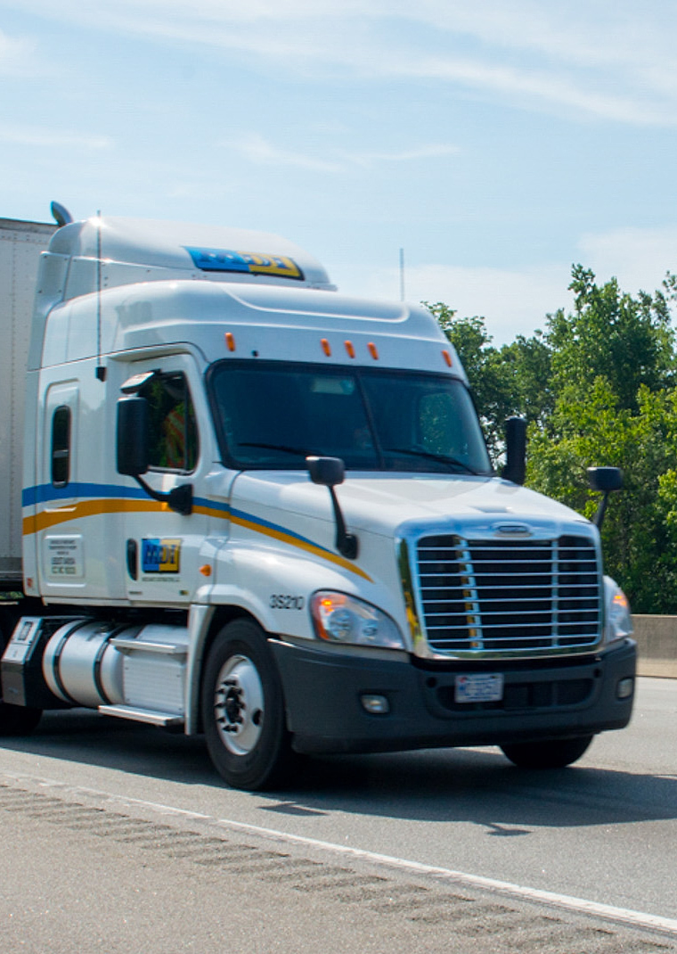 Commercial tractor-trailer traveling on a U.S. interstate